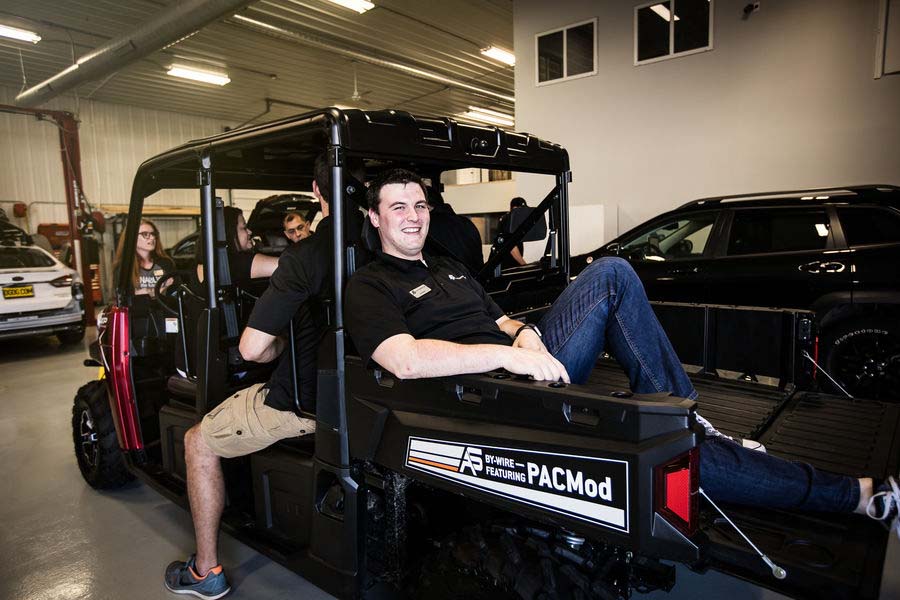 Two people sitting inside Polaris Gem