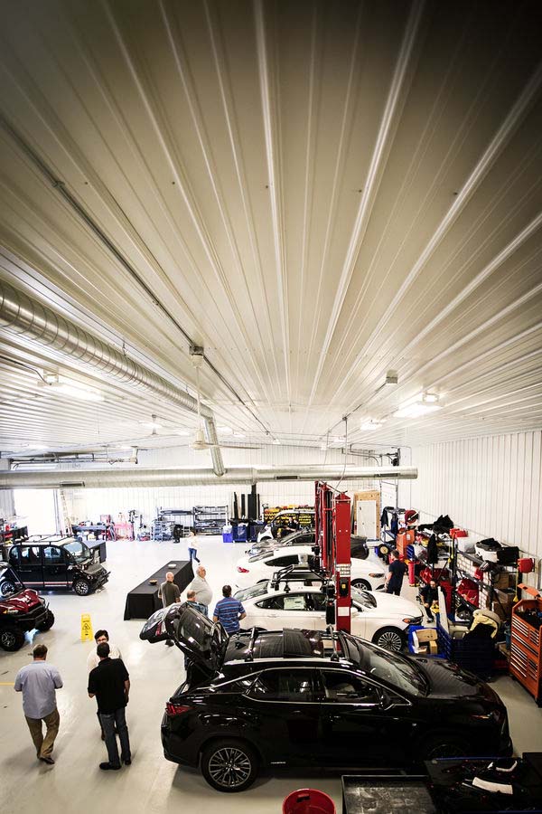 Overhead view of shop with vehicles