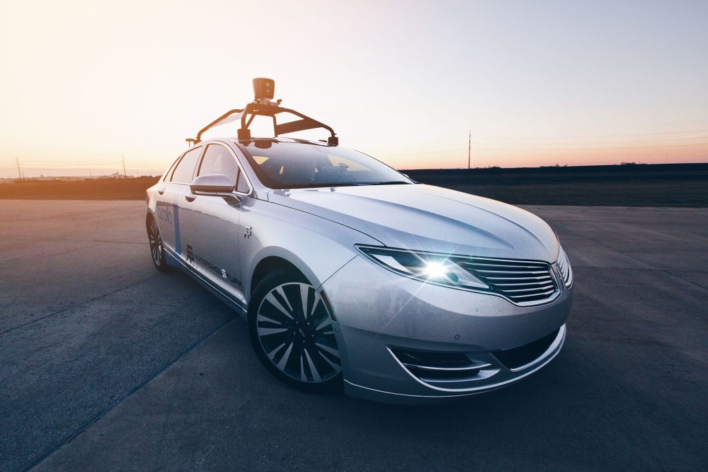 Autonomous vehicle outside at sunset