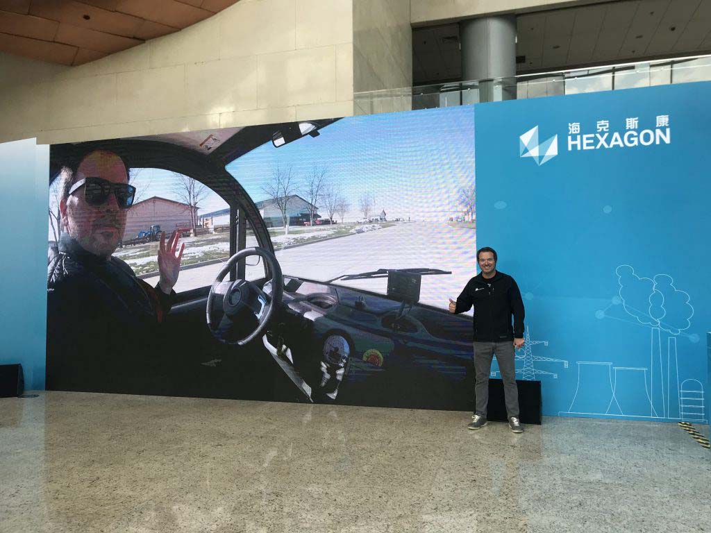 Man standing in front of a display