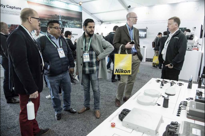 Group of people looking at a display