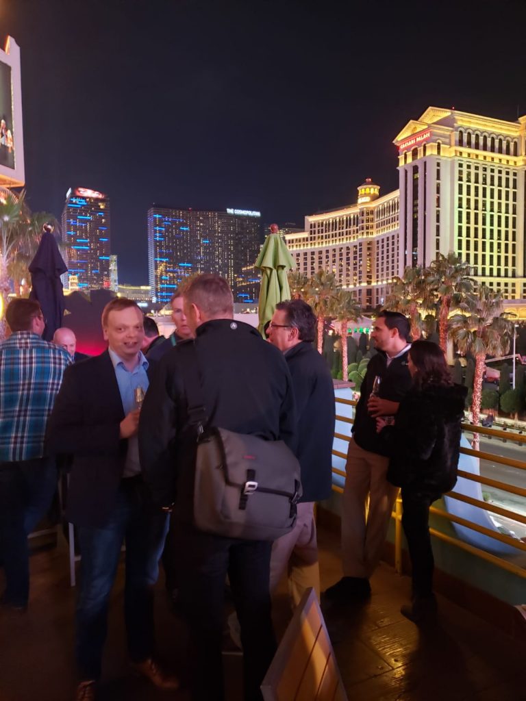 Group of people talking on a patio