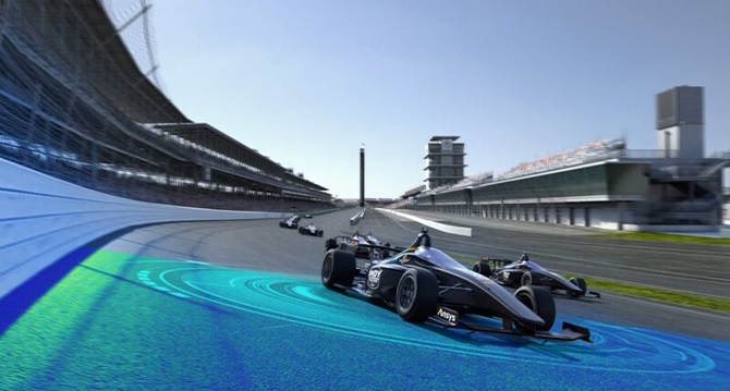 Indy car on a race track with glowing graphics