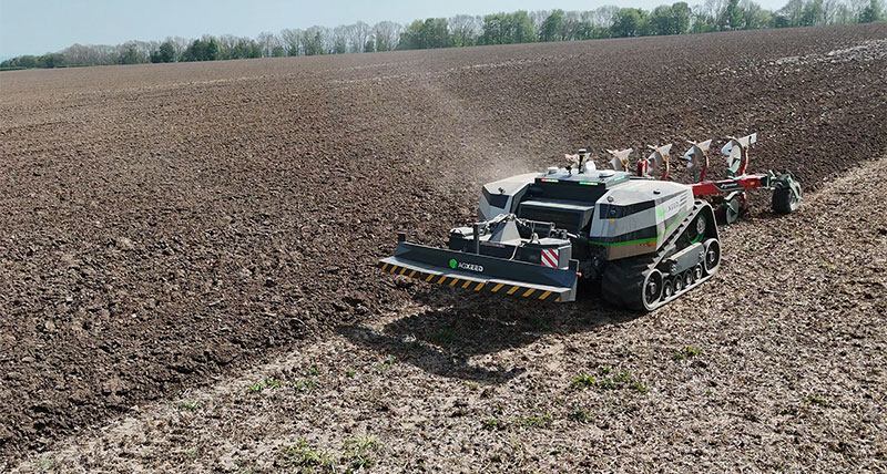 AgXeed’s AgBot autonomous tractor ploughing a field.